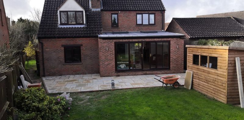 Finished rear extension with bifold doors and a new patio in Hartpury