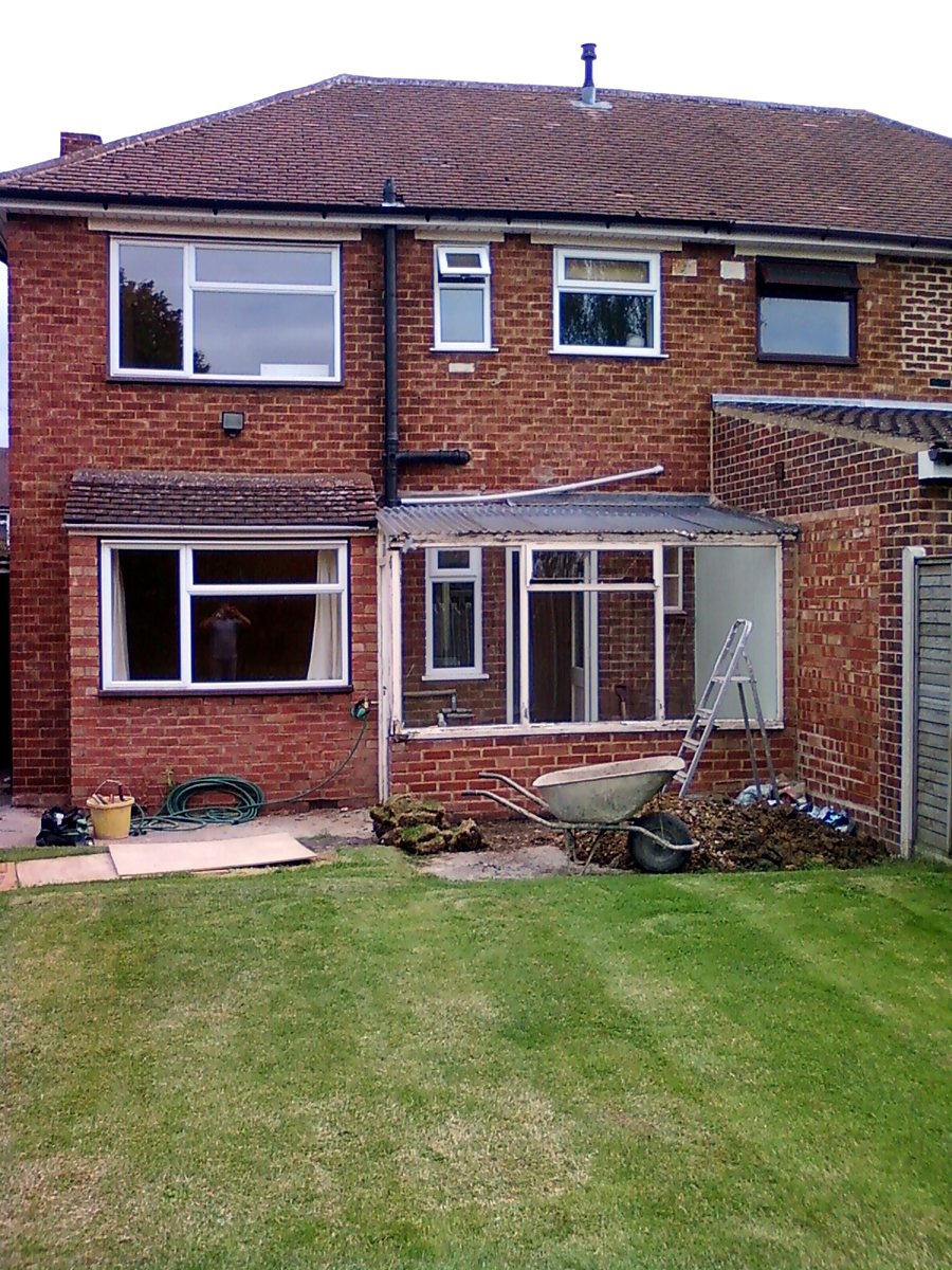 Rear of the semi-detached house before work, with an old lean-to