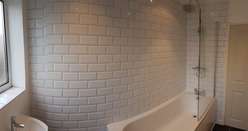 Finished bathroom with new suite and tiling in Quedgeley, Gloucester